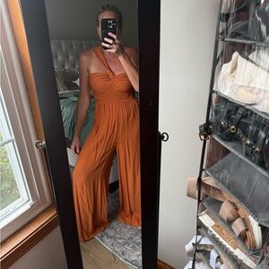 Lush Orange Jumpsuit with Wide-Leg Palazzo and Plunging V-Neckline